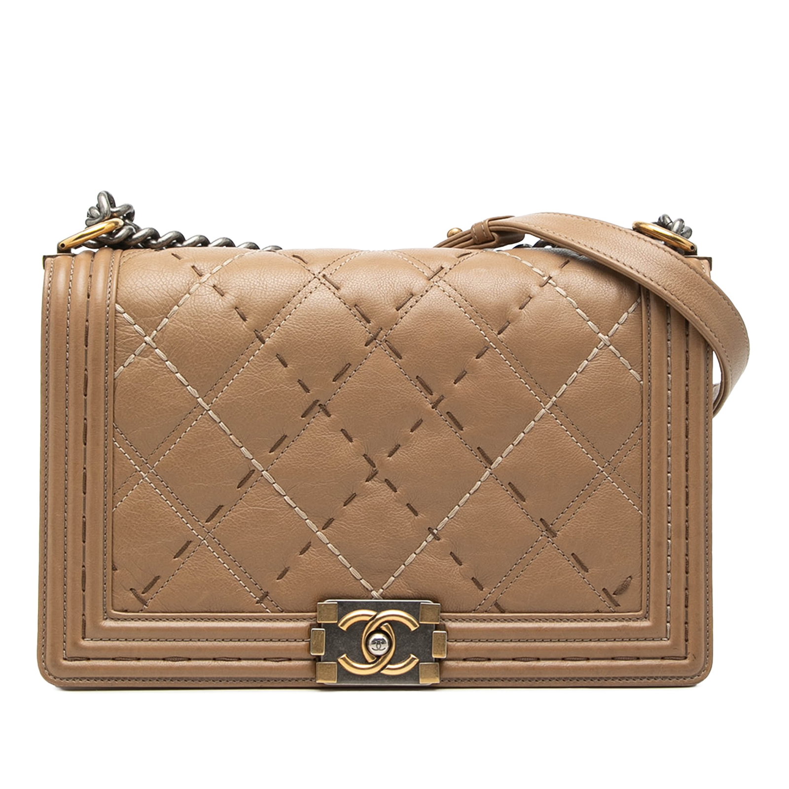 Chanel Boy Flap quilted calfskin crossbody medium beige: Chanel Boy Flap quilted calfskin crossbody medium beige This Chanel Medium Quilted Calfskin Wild Stitch Boy Flap crossbody bag features a beige calfskin leather body with distinctive wild stitch detai