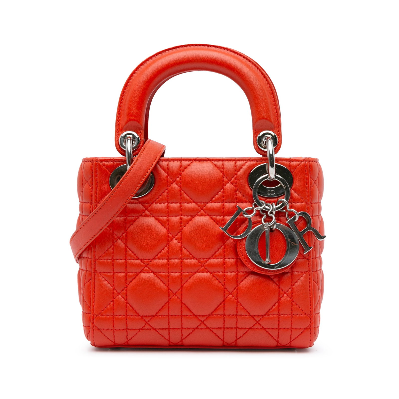 Dior Mini Lambskin Cannage Lady Dior Handbag Red Leather: Dior Mini Lambskin Cannage Lady Dior Handbag Red Leather The Mini Lady Dior is a chic handbag crafted from luxurious quilted lambskin leather. This exquisite piece features flat leather top handles an