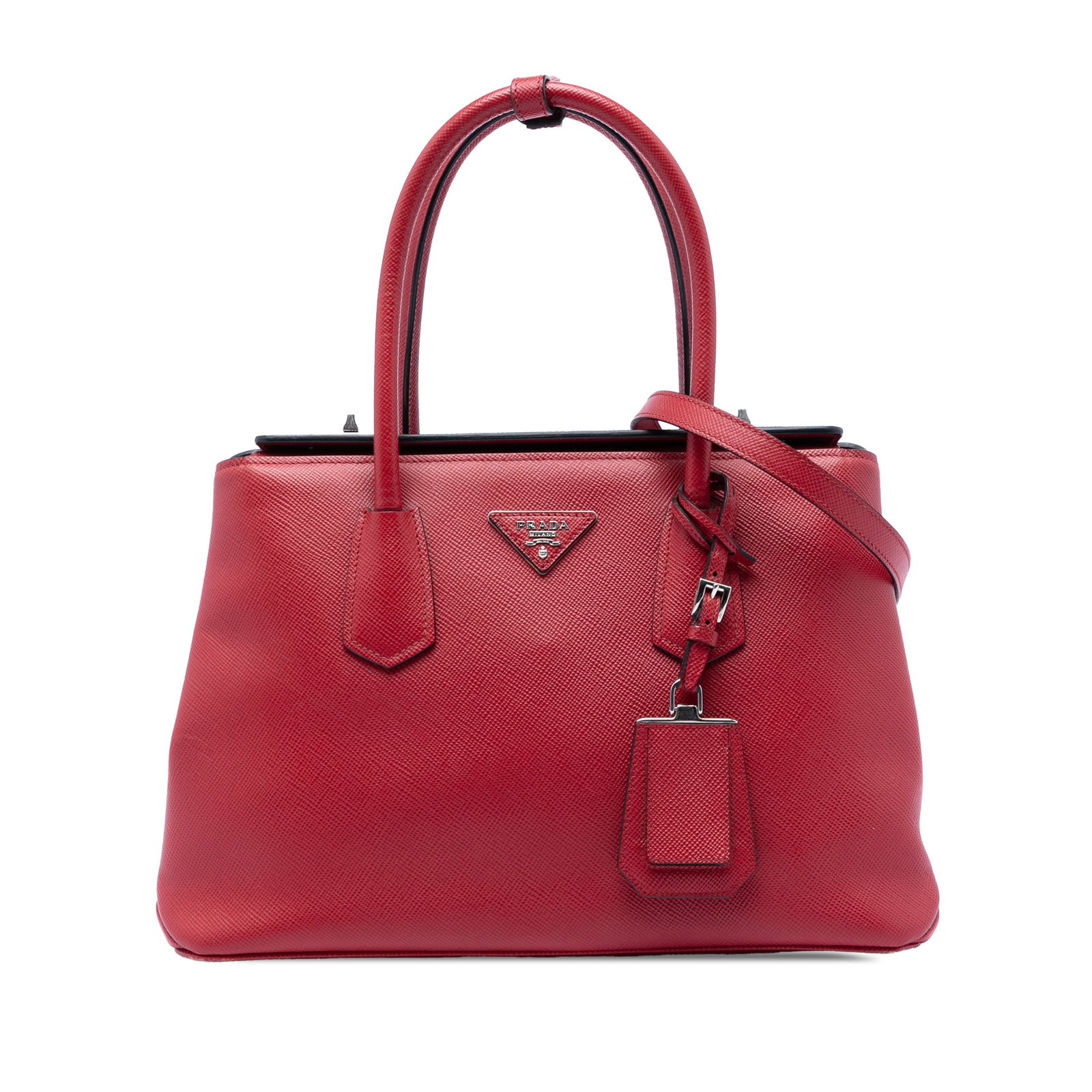 Prada Saffiano Cuir red leather satchel with turn lock closures: Prada Saffiano Cuir red leather satchel with turn lock closures This Prada Saffiano Cuir Turnlock Twin Satchel is crafted from saffiano leather in a striking red hue. It features rolled leather handle