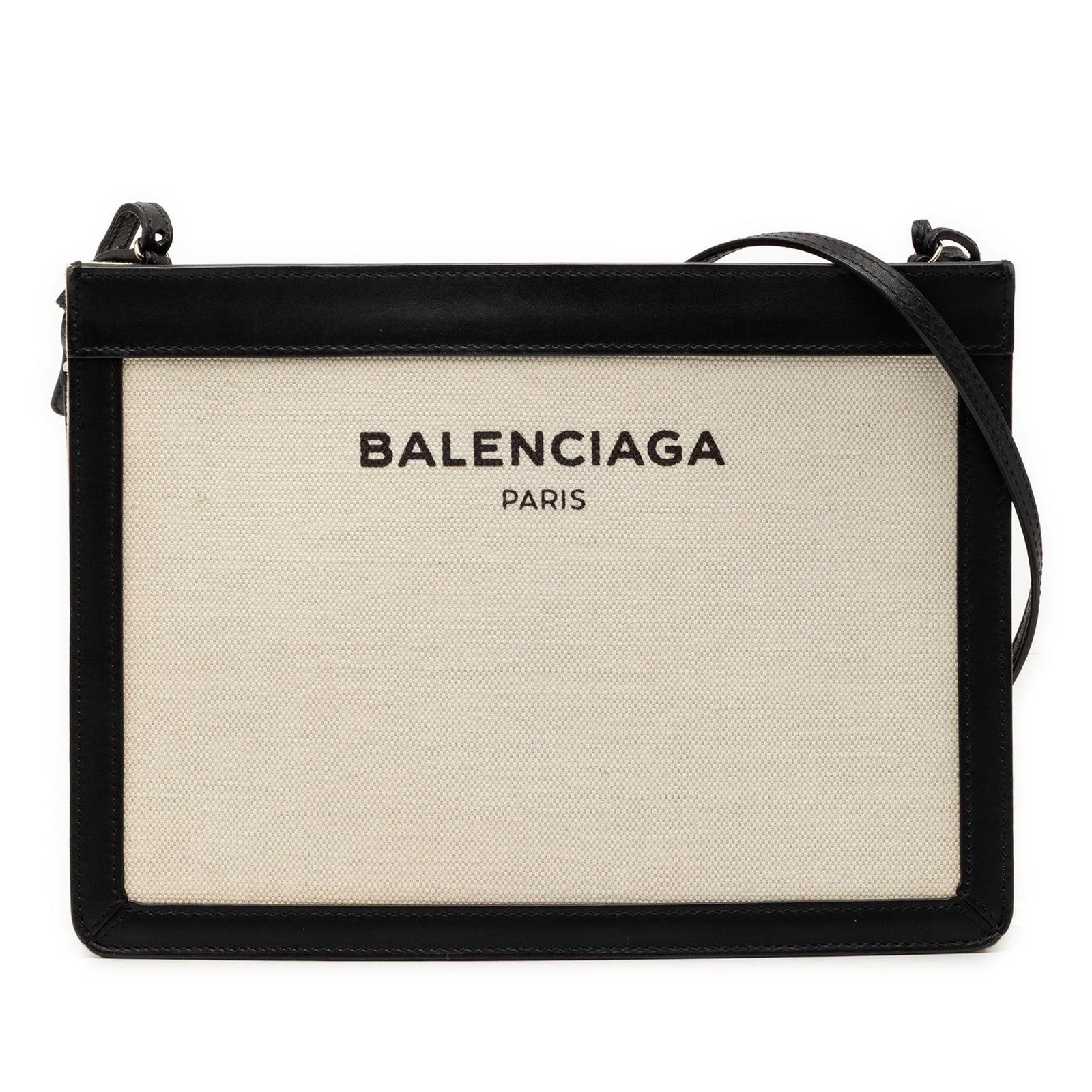 Balenciaga brown canvas pochette crossbody with leather trim: Balenciaga brown canvas pochette crossbody with leather trim This Balenciaga Canvas Navy Pochette Crossbody features a canvas body with leather trim, an adjustable flat leather shoulder strap, a top z