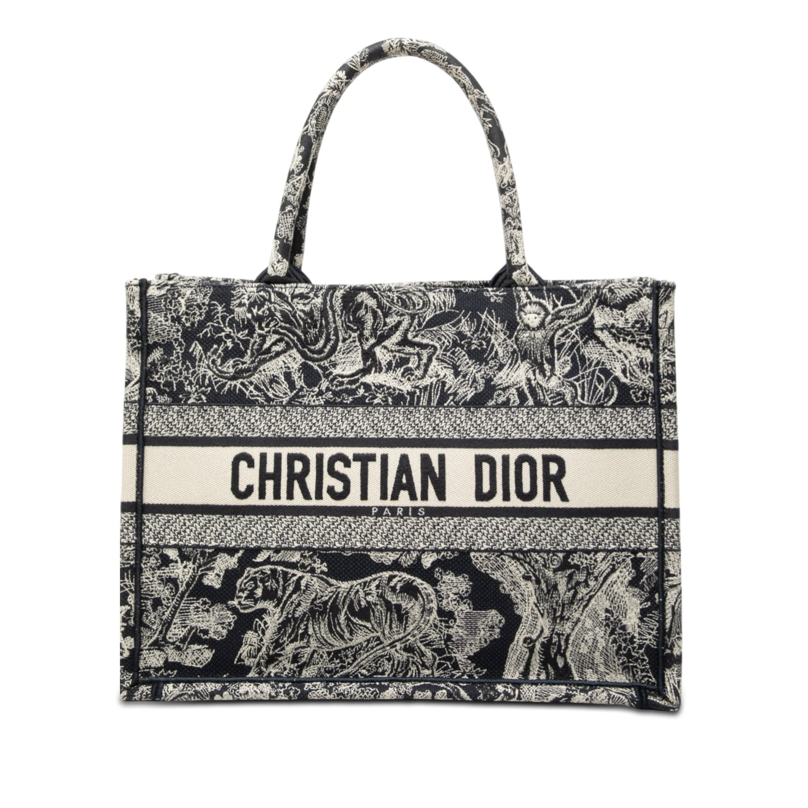 Dior Medium Book Tote Blue Embroidered Canvas: Dior Medium Book Tote Blue Embroidered Canvas This Dior Medium Canvas Embroidered Reverse Dioriviera Toile De Jouy Book Tote showcases a beautifully embroidered canvas body in blue, complemented by ro