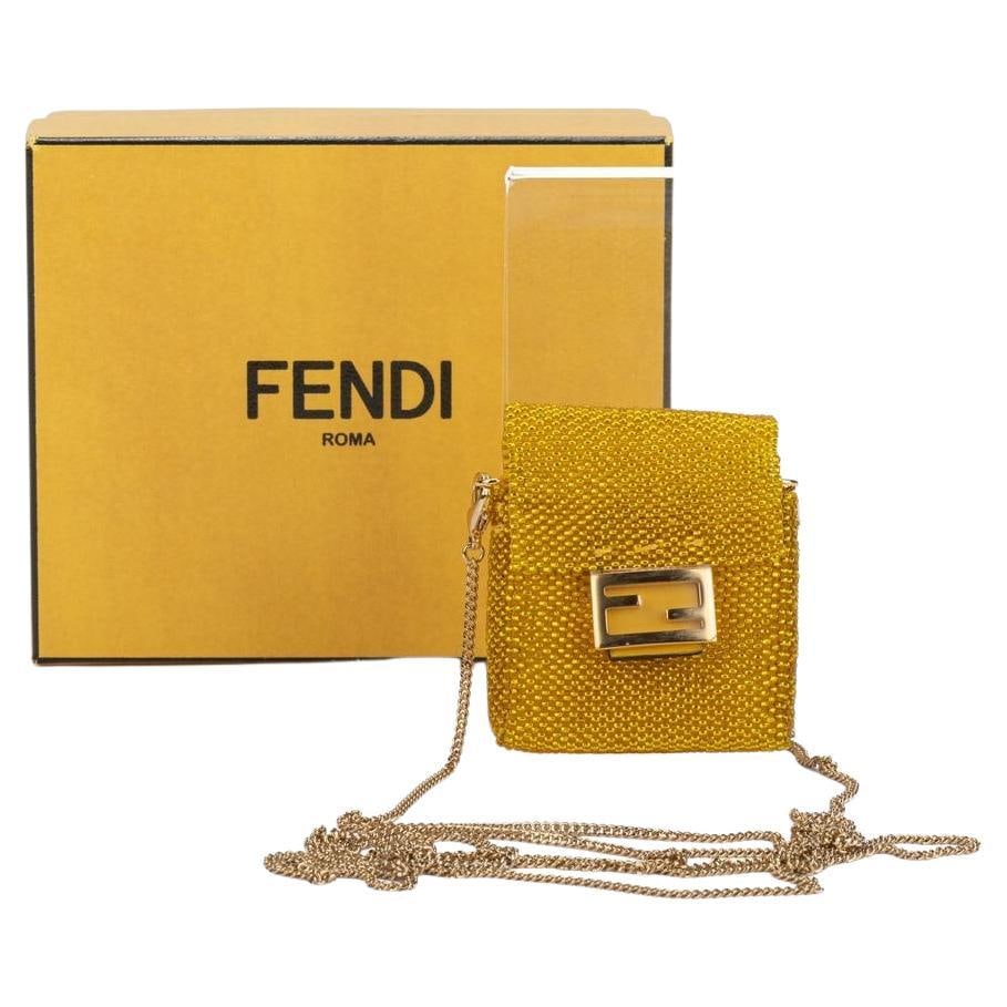 Fendi Yellow Seabeds Micro Baguette with 23" Strap New in Box: Fendi Yellow Seabeds Micro Baguette with 23" Strap New in Box Introducing the Fendi Yellow Seabeds Micro Baguette, a stylish and versatile accessory that combines functionality with high fashion. This