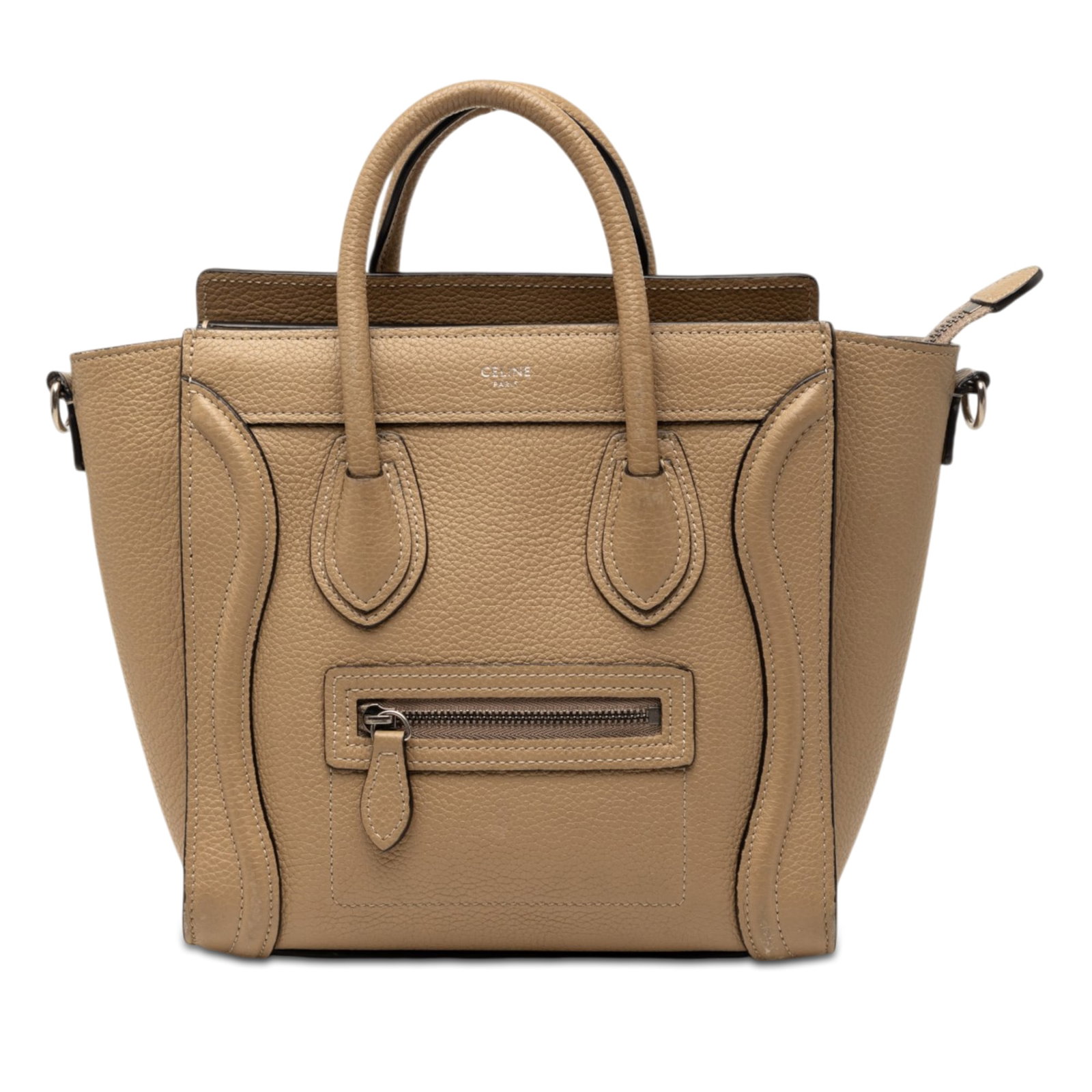 Celine Nano Leather Luggage Tote Beige: Celine Nano Leather Luggage Tote Beige This Celine Nano Leather Luggage Tote showcases a beige leather exterior with rolled leather handles and a top zip closure. The bag features an exterior front zi