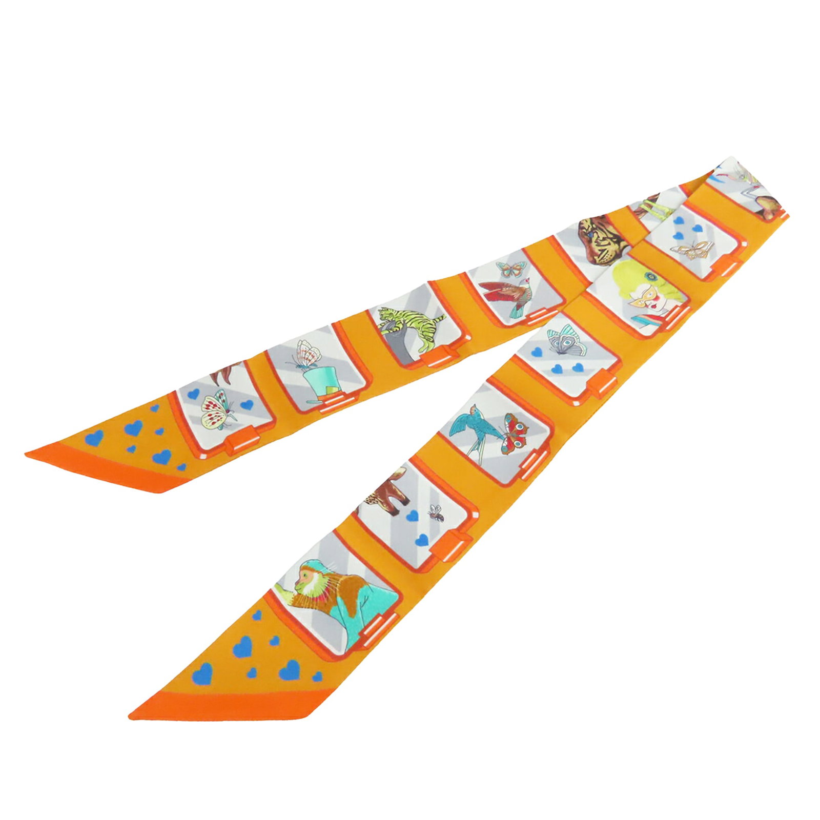 Hermes Story Orange Silk Twilly Scarf: Hermes Story Orange Silk Twilly Scarf This Hermes Story Silk Twilly Scarf is crafted from 100% silk and features a distinctive printed design. Made in France, it comes in an orange color and is catego