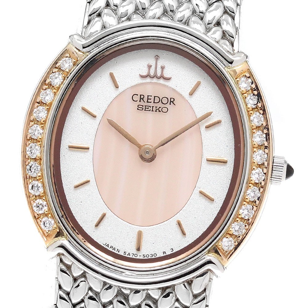 Seiko Credor ladies quartz wristwatch GSWE986 5A70-3000: Seiko Credor ladies quartz wristwatch GSWE986 5A70-3000 This Seiko Credor women's wristwatch, model GSWE986/5A70-3000, is crafted in Japan and features a stainless steel case and band with pink accent