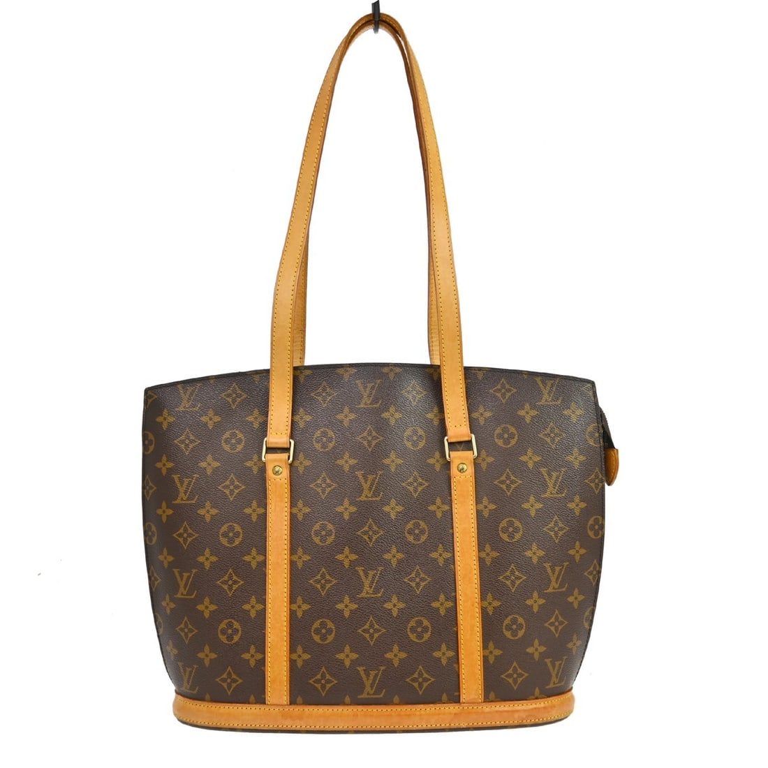 Louis Vuitton Babylone Monogram Canvas Tote Bag M51102: Louis Vuitton Babylone Monogram Canvas Tote Bag M51102 This Louis Vuitton Babylone handbag features the iconic monogram canvas leather exterior, complemented by beige leather double handles and a zip 
