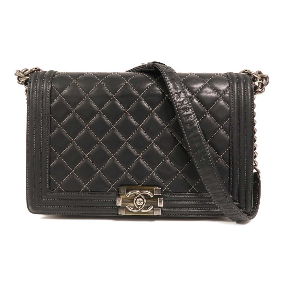 Chanel Boy 28 Black Calfskin Leather Silver Shoulder Bag: Chanel Boy 28 Black Calfskin Leather Silver Shoulder Bag This CHANEL Boy 28 shoulder bag features black cowhide calfskin leather with silver-tone hardware accents. Designed for women, it offers a clas
