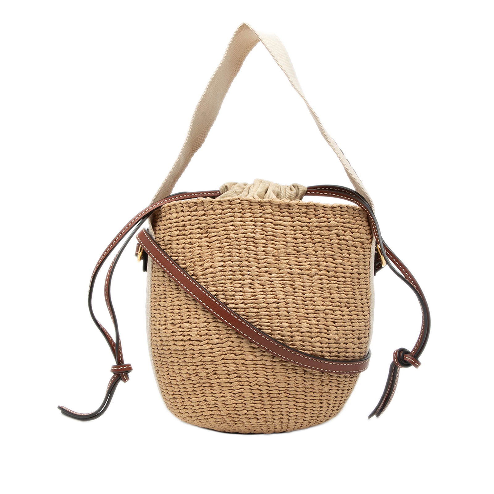 Chloe woven raffia bucket bag with leather strap: Chloe woven raffia bucket bag with leather strap This Chloe Small Raffia Woody Basket Bucket Bag features a woven raffia body with a flat handle and a flat leather shoulder strap. It is designed with 