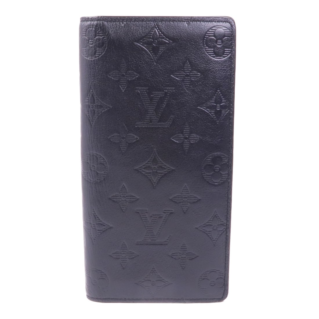 Louis Vuitton Brazza Monogram Shadow Black Long Wallet: Louis Vuitton Brazza Monogram Shadow Black Long Wallet This Louis Vuitton Brazza Long Wallet features the Monogram Shadow design in black calfskin leather. Designed as a bifold wallet, it offers a sle