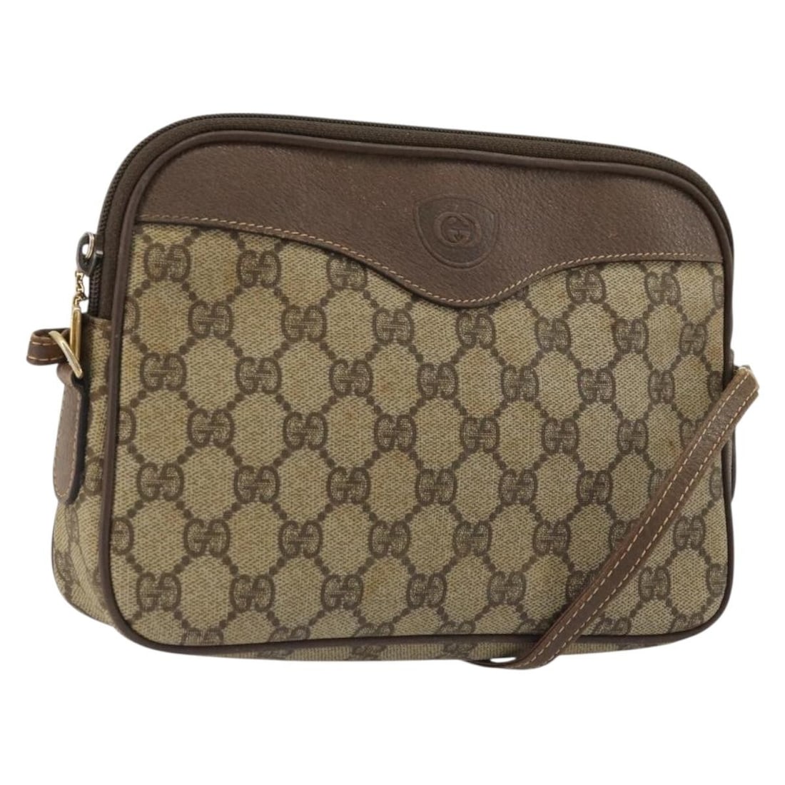 Beige Canvas GG Supreme Shoulder Purse by Gucci: Beige Canvas GG Supreme Shoulder Purse by Gucci This Gucci GG Supreme Shoulder Bag is crafted from beige canvas and designed for women. It features a classic shoulder bag silhouette with noticeable si