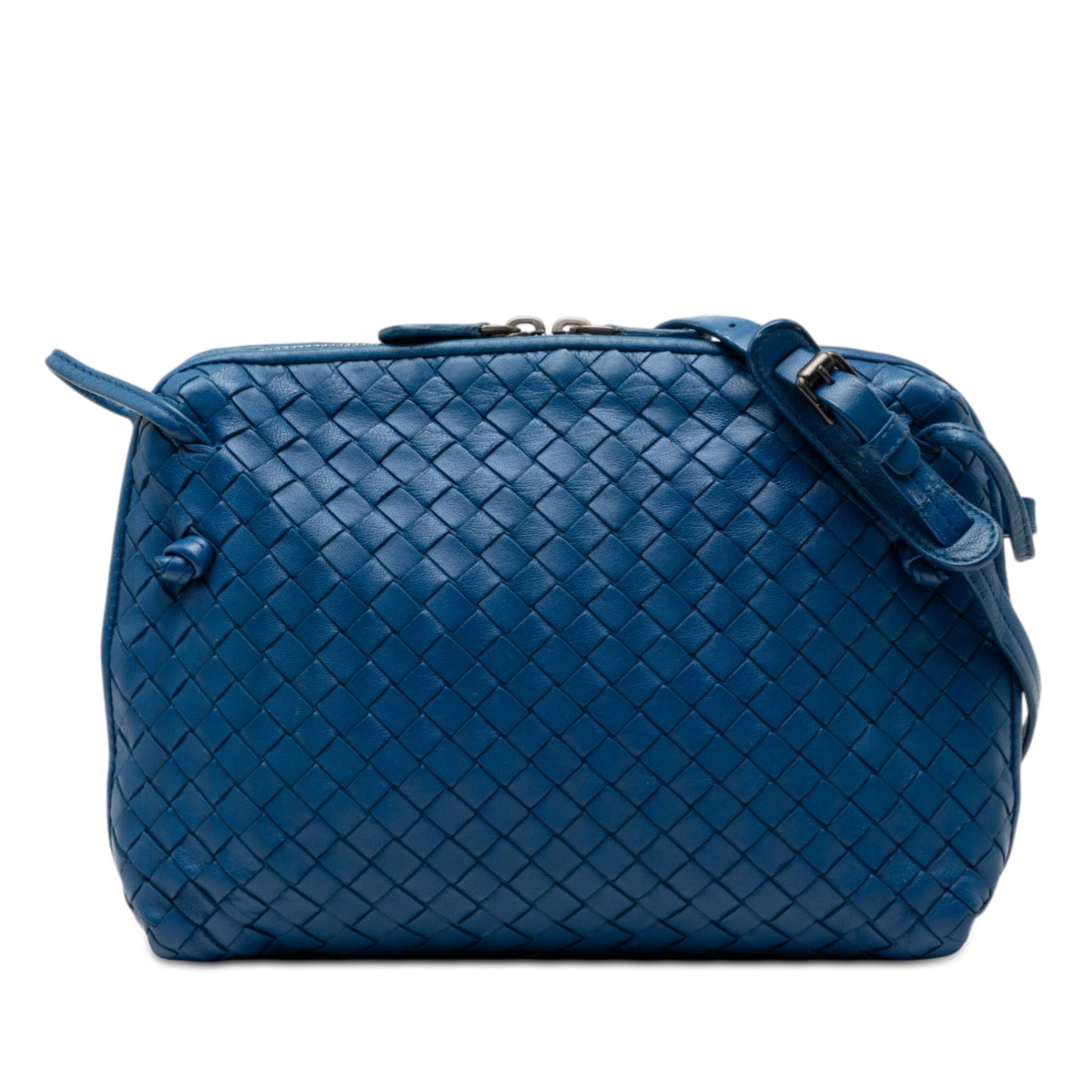 Bottega Veneta blue woven leather Nodini crossbody bag: Bottega Veneta blue woven leather Nodini crossbody bag This Bottega Veneta Nappa Intrecciato Nodini Crossbody bag features the brand's signature woven leather design in blue. It is crafted with an adj