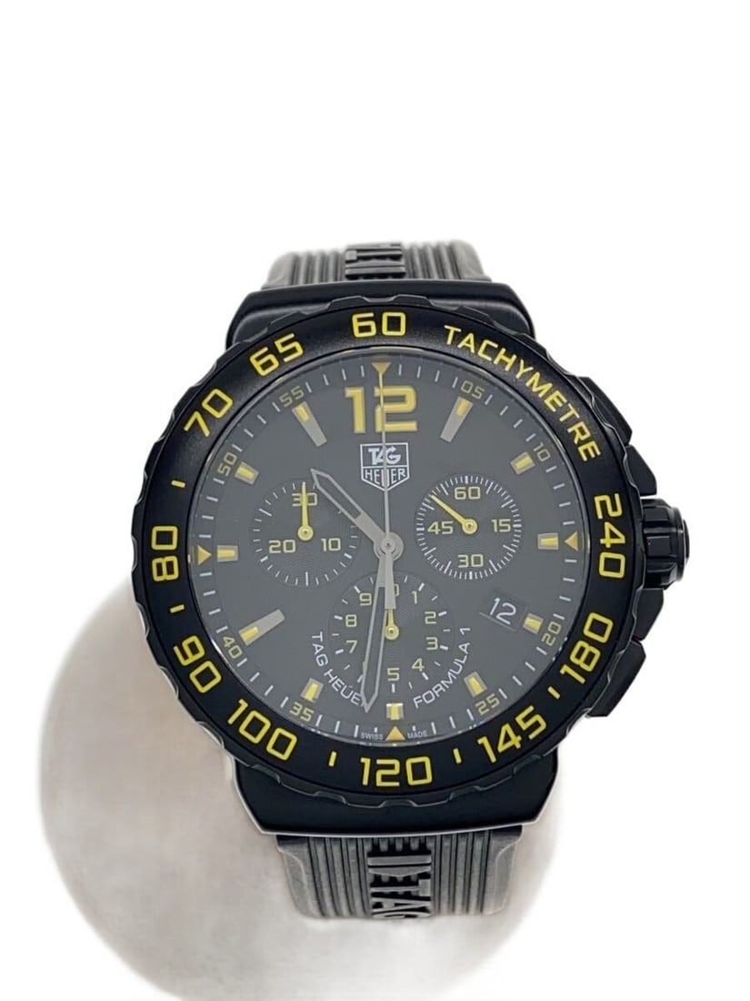 TAG Heuer Formula 1 men's quartz wristwatch CAU111E: TAG Heuer Formula 1 men's quartz wristwatch CAU111E This TAG Heuer Formula 1 Quartz CAU111E men's wristwatch features a black case and dial, crafted with materials sourced from Switzerland. Designed f