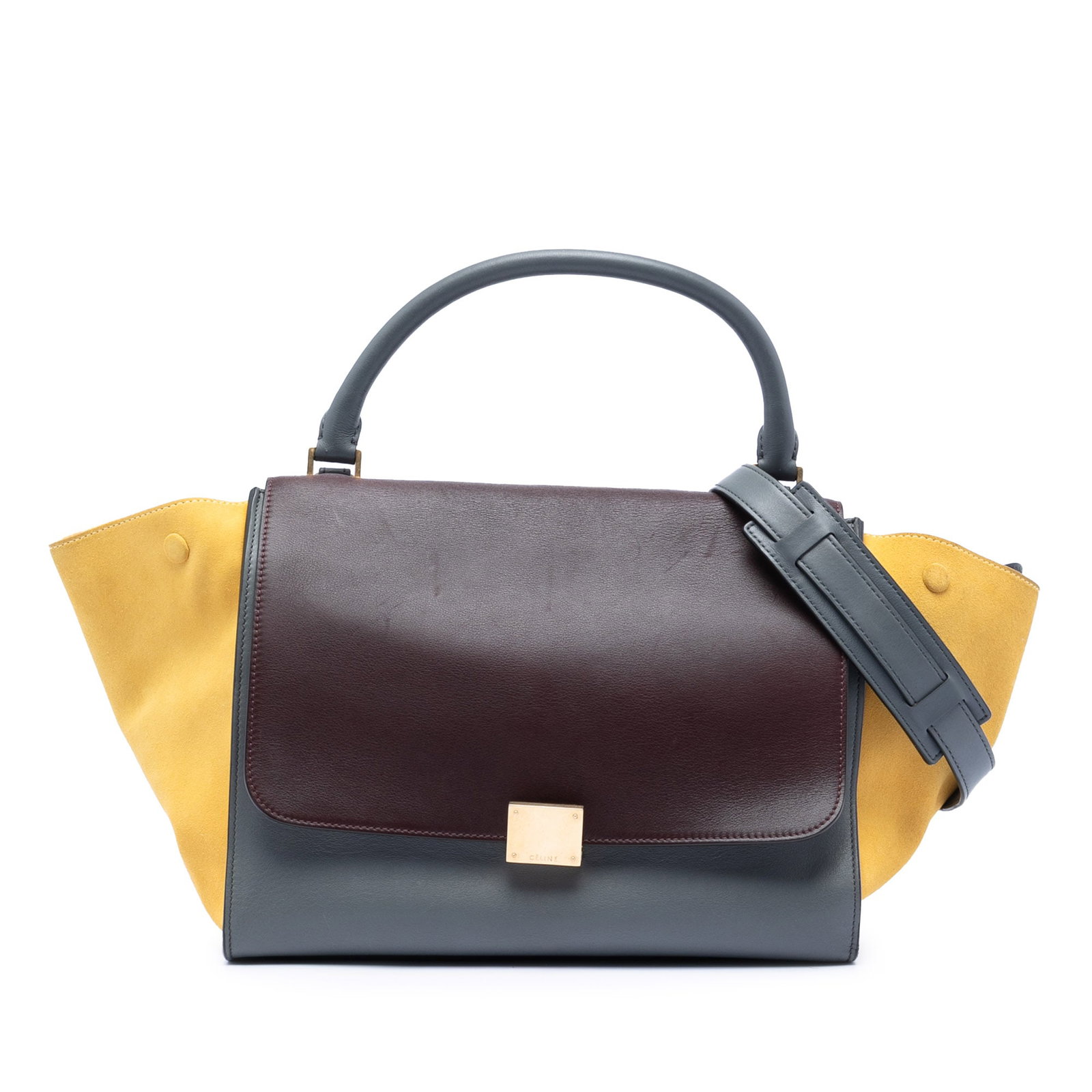 Celine Trapeze medium tri color calfskin suede satchel: Celine Trapeze medium tri color calfskin suede satchel This Celine Medium Tricolor Trapeze Satchel is crafted from calfskin and suede, featuring a structured silhouette with a rolled top handle and a 