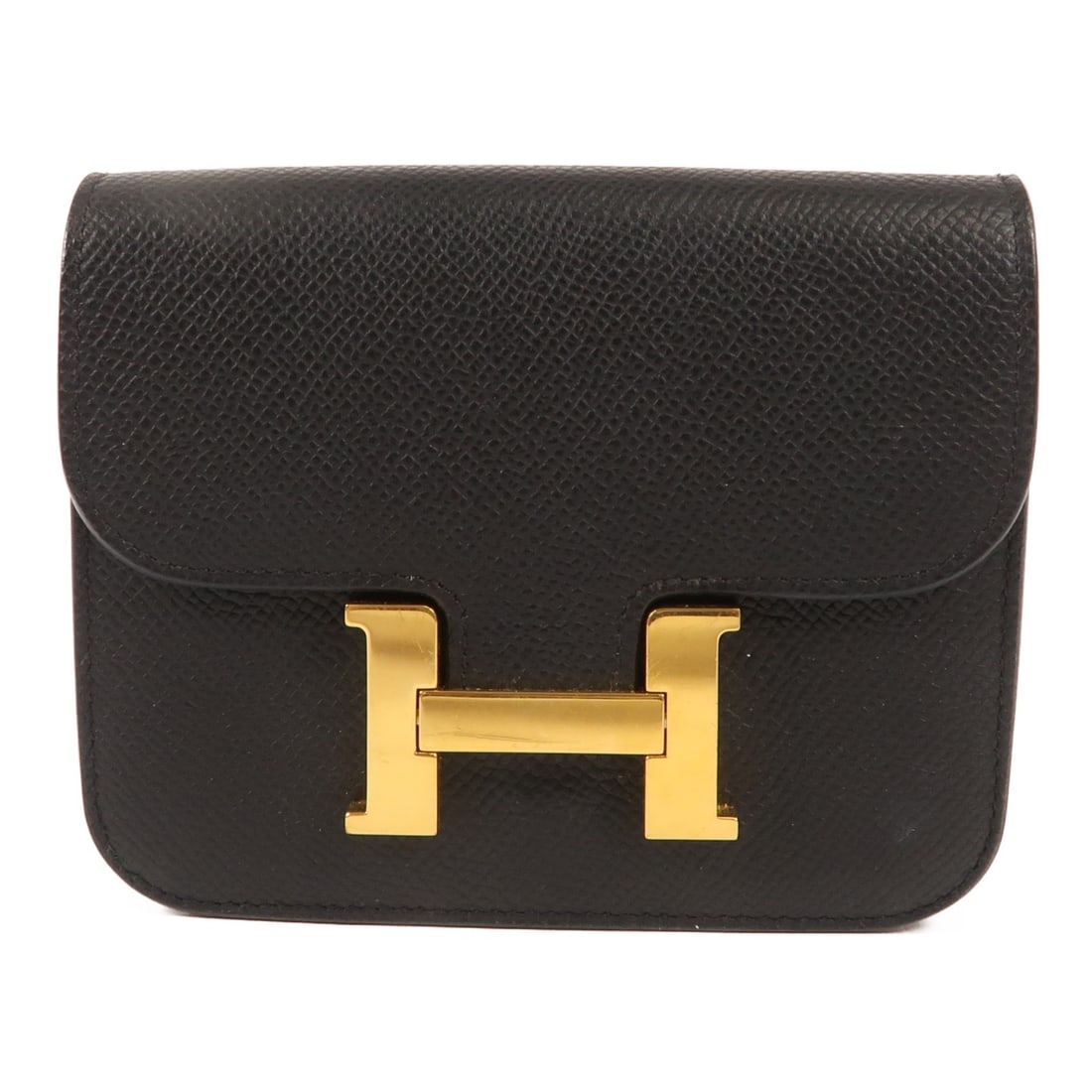 Hermes Constance Slim bi-fold wallet GHW black Epsom leather: Hermes Constance Slim bi-fold wallet GHW black Epsom leather This Hermes Constance Slim Wallet is crafted from black Epsom calfskin leather and features a bi-fold design. Designed for women, it offers