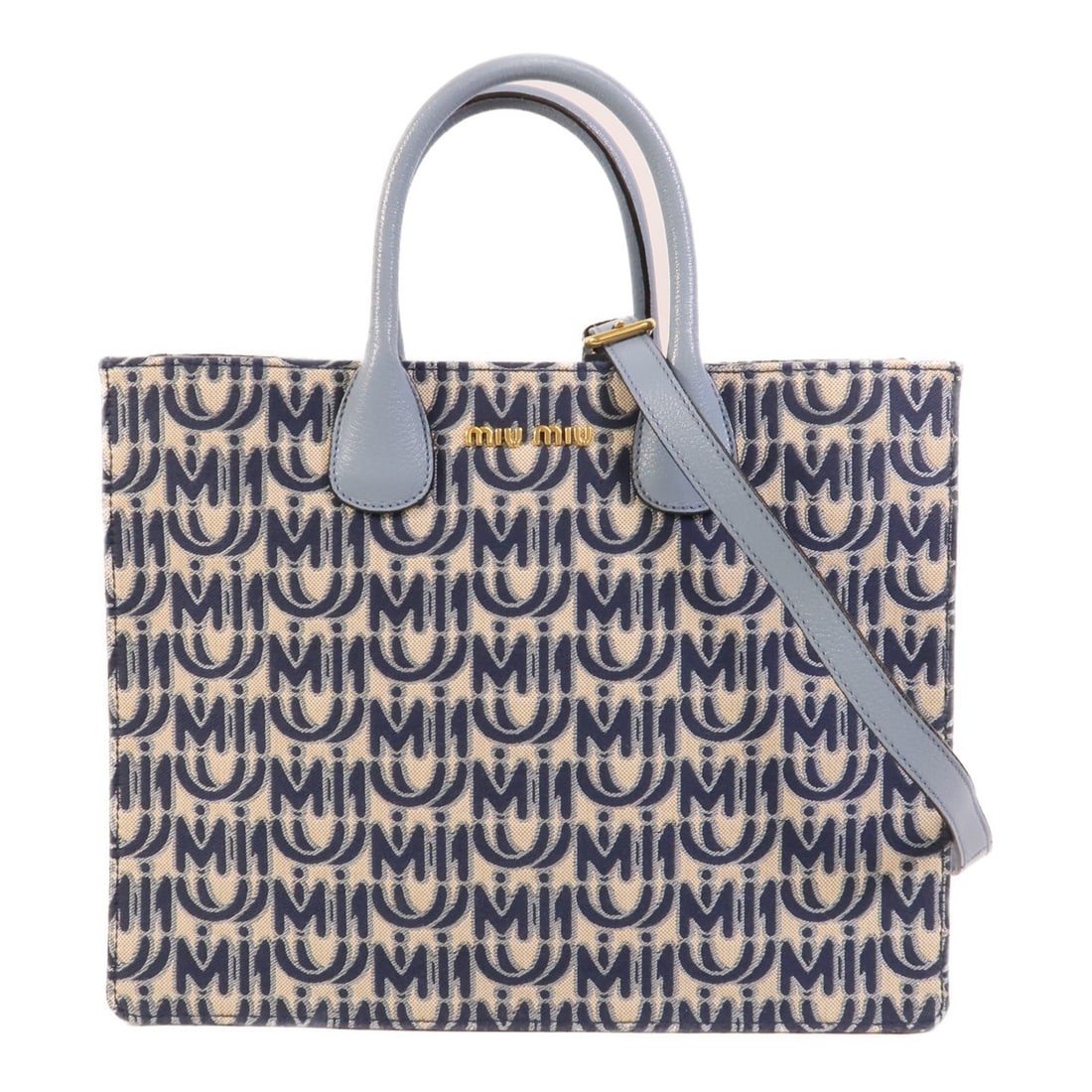 Miu Miu Blue Canvas 2way Shoulder Bag GHW: Miu Miu Blue Canvas 2way Shoulder Bag GHW This Miu Miu 2-way shoulder bag features a versatile design crafted from durable blue canvas. Made in Italy, the bag offers both style and practicality, suita