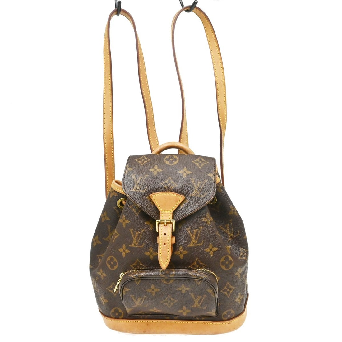 Louis Vuitton Monogram Canvas Montsouris Vintage Backpack: Louis Vuitton Monogram Canvas Montsouris Vintage Backpack This Louis Vuitton Vintage Montsouris Backpack features the classic monogram canvas in brown, designed for women. The bag shows visible signs 