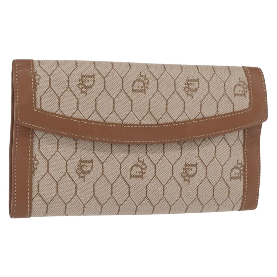 Beige Coated Canvas Vintage Honeycomb Wallet by Christian Dior: Beige Coated Canvas Vintage Honeycomb Wallet by Christian Dior This vintage Christian Dior Honeycomb flap wallet is crafted from beige coated canvas and designed for women. Made in Spain, it features 