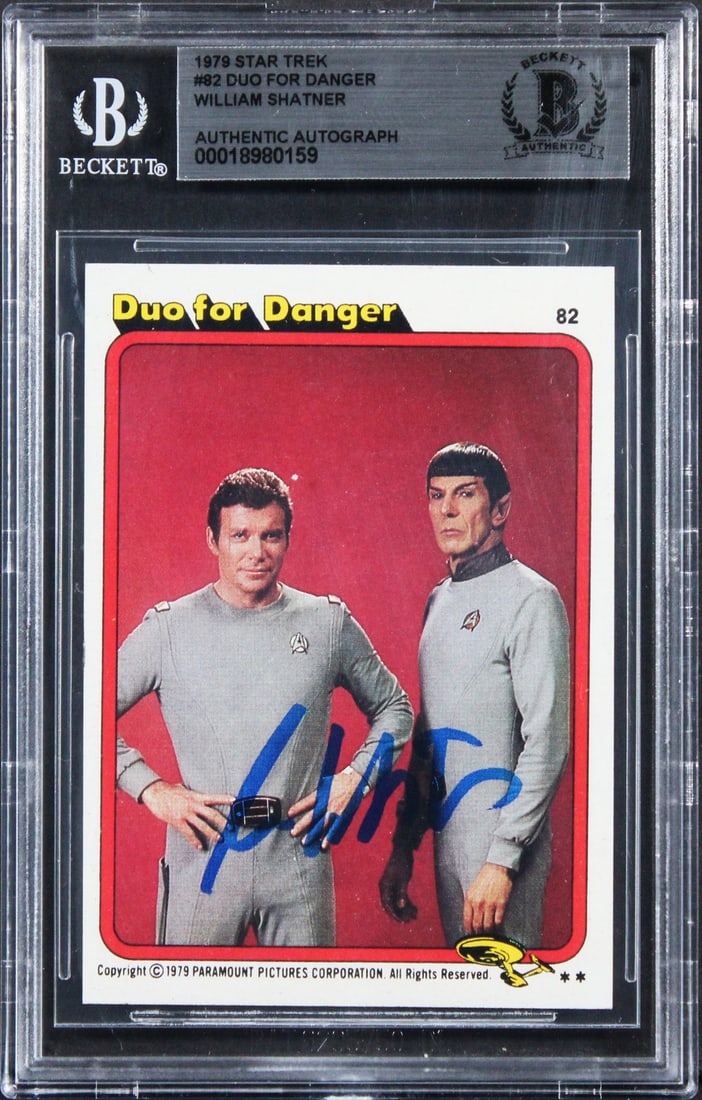 William Shatner Autographed 1979 Star Trek Duo For Danger Card Beckett Authenticated: William Shatner Autographed 1979 Star Trek Duo For Danger Card Beckett Authenticated This 1979 Star Trek #82 Duo For Danger trading card features the authentic signature of William Shatner, the iconic