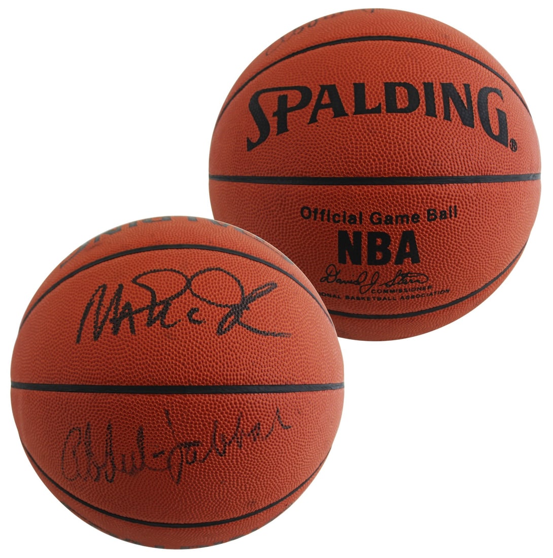 Kareem Abdul-Jabbar Magic Johnson Signed Spalding Basketball Beckett Authenticated: Kareem Abdul-Jabbar Magic Johnson Signed Spalding Basketball Beckett Authenticated This is an original autographed Spalding basketball signed by the legendary Kareem Abdul-Jabbar and Magic Johnson, bo