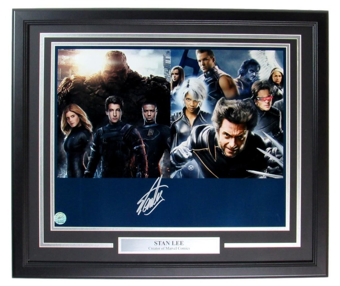 Framed 16x20 Photograph Signed by Stan Lee with Stan Lee Authentics Sticker: Framed 16x20 Photograph Signed by Stan Lee with Stan Lee Authentics Sticker This framed 16x20 photo features an authentic signature from Stan Lee, renowned creator at Marvel Comics. The item is presen