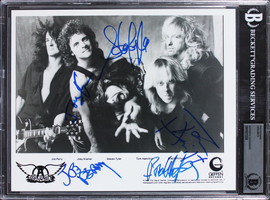 Aerosmith Signed 8x10 Photo by Tyler Perry Kramer Hamilton Whitford Beckett Authenticated: Aerosmith Signed 8x10 Photo by Tyler Perry Kramer Hamilton Whitford Beckett Authenticated This is an autographed 8x10 promotional photograph featuring the iconic rock band Aerosmith. The photo is pers