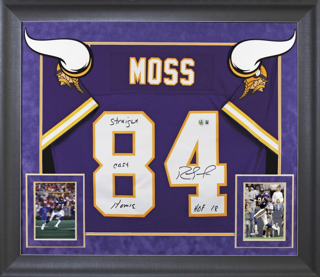 Randy Moss Signed 1998 Vikings Purple Jersey Framed BAS Witnessed: Randy Moss Signed 1998 Vikings Purple Jersey Framed BAS Witnessed Celebrate the legacy of Randy Moss with this stunning autographed Minnesota Vikings jersey. This original 1998 Mitchell & Ness Throwba