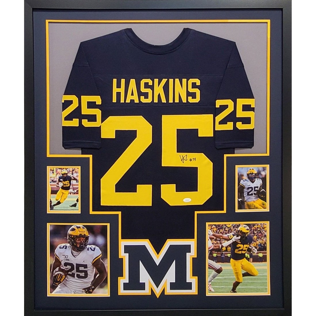 Framed Michigan Jersey Signed by Hassan Haskins with JSA Authentication: Framed Michigan Jersey Signed by Hassan Haskins with JSA Authentication This framed jersey is autographed by Hassan Haskins and features a Michigan logo. The jersey is authenticated by JSA and include