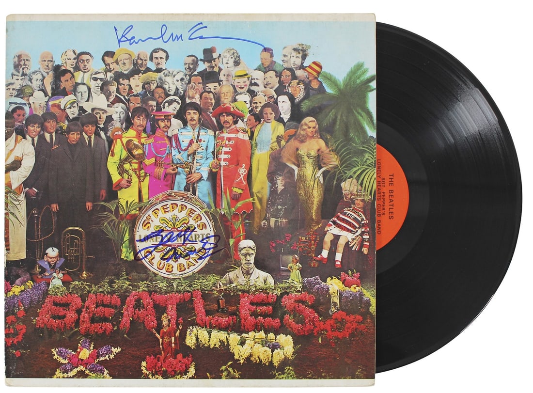 Beatles Signed Sgt Pepper Album Cover by McCartney & Martin JSA: Beatles Signed Sgt Pepper Album Cover by McCartney & Martin JSA This autographed Sgt. Pepper's Lonely Hearts Club Band album cover, complete with vinyl, has been personally signed by Paul McCartney an