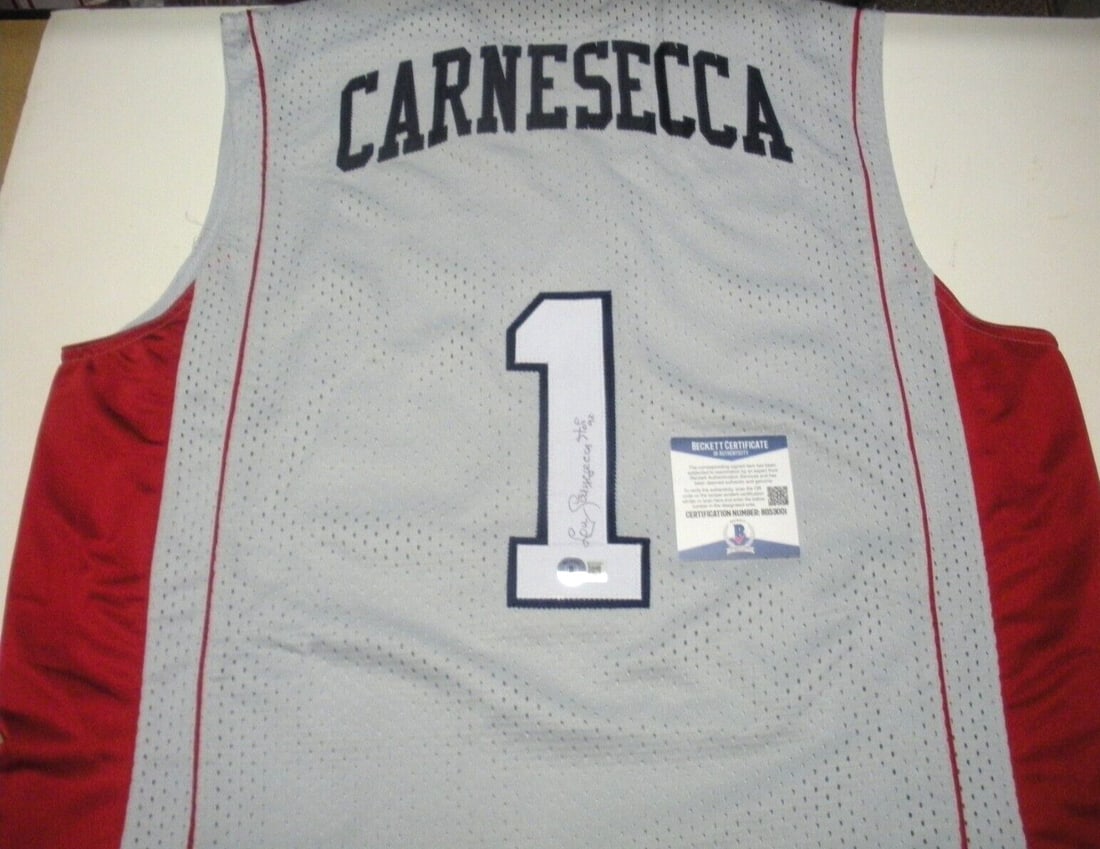 Nike Basketball Jersey Signed by Lou Carnesecca St Johns Red Storm Beckett COA: Nike Basketball Jersey Signed by Lou Carnesecca St Johns Red Storm Beckett COA This is an official licensed Nike basketball jersey signed by Lou Carnesecca of the St. John's Red Storm. The jersey come