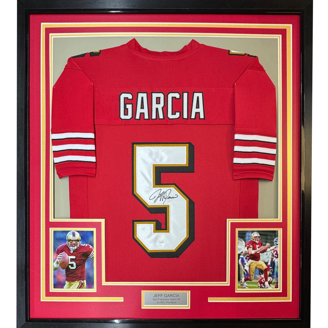 Jeff Garcia Signed Framed 33x42 Red 49ers Jersey JSA COA: Jeff Garcia Signed Framed 33x42 Red 49ers Jersey JSA COA This professionally framed and matted red football jersey features the authentic autograph of Jeff Garcia, former NFL quarterback for the San F