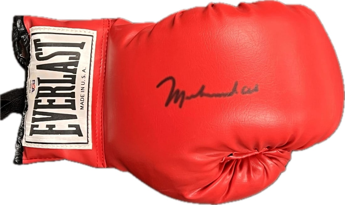 Muhammad Ali Signed Boxing Glove PSA/DNA Authentication: Muhammad Ali Signed Boxing Glove PSA/DNA Authentication This is an original boxing glove signed by legendary boxer Muhammad Ali, also known as Cassius Clay. The autograph has been authenticated by PSA
