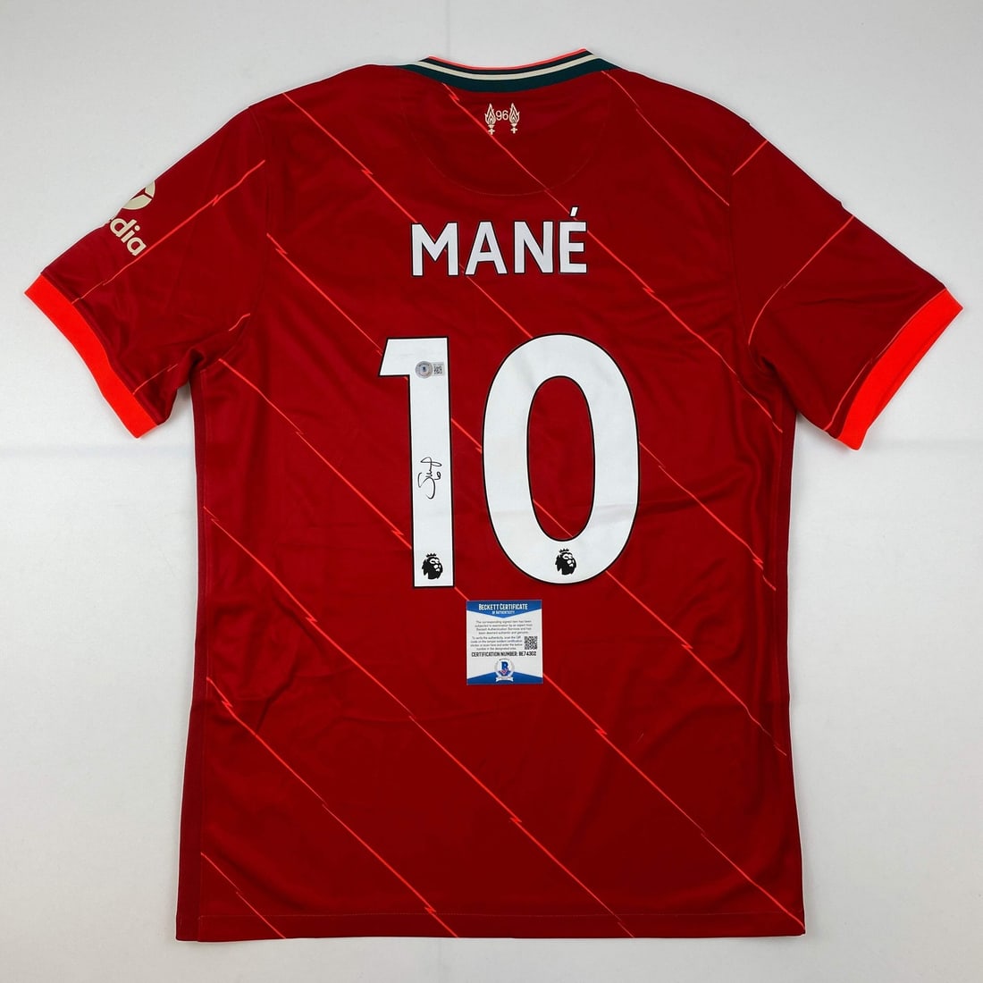 Sadio Mane Autographed Liverpool Jersey Beckett BAS COA Gem Mint: Sadio Mane Autographed Liverpool Jersey Beckett BAS COA Gem Mint Celebrate your passion for soccer with this authentic autographed Sadio Mane Liverpool red jersey, perfect for fans and collectors alik