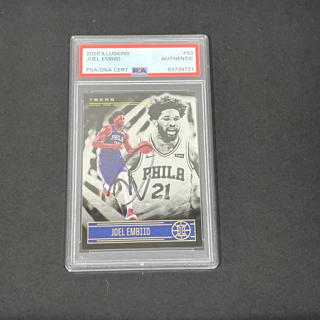2020 Panini Illusions #53 Joel Embiid Autographed Card PSA/DNA: 2020 Panini Illusions #53 Joel Embiid Autographed Card PSA/DNA This 2020 Panini Illusions Hoops #53 sports trading card features the autograph of Joel Embiid, star player of the Philadelphia 76ers. Th