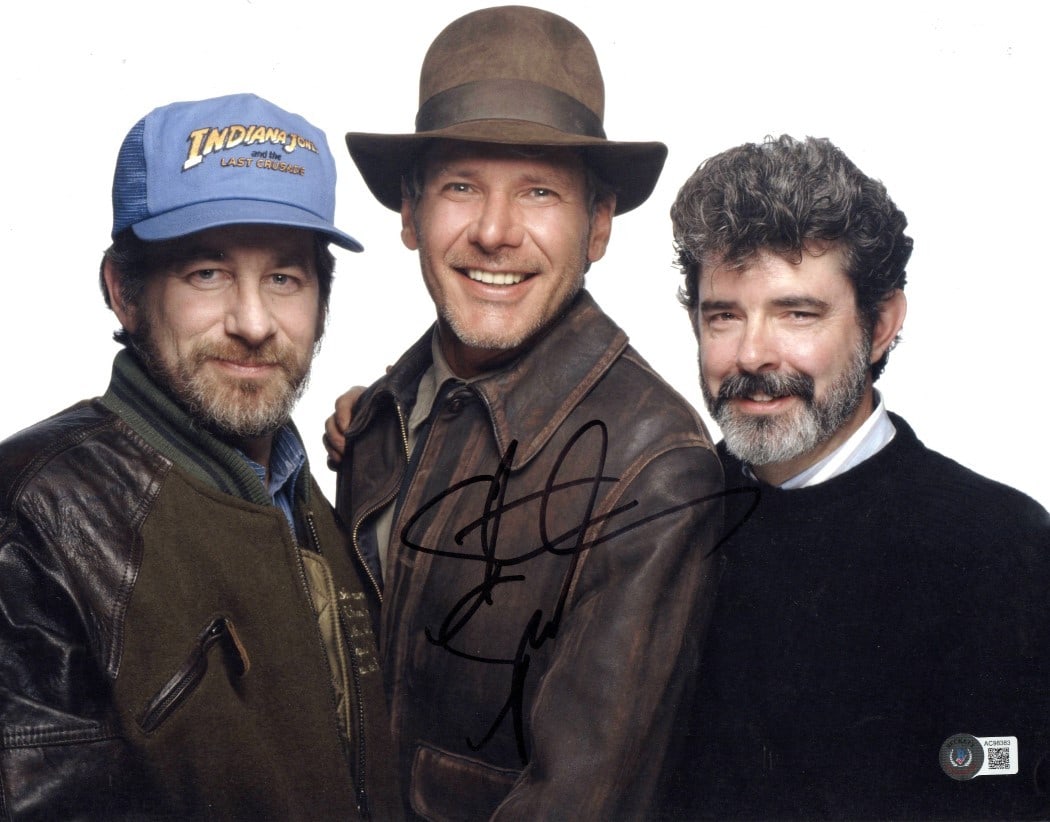 Steven Spielberg Autographed 11X14 Indiana Jones Photo Beckett Authenticated: Steven Spielberg Autographed 11X14 Indiana Jones Photo Beckett Authenticated This captivating 11x14 photograph features the iconic director Steven Spielberg, known for his work on the Indiana Jones fr