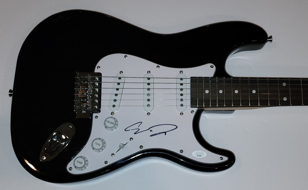 JSA Authenticated Chris Daughtry Electric Guitar with Pick: JSA Authenticated Chris Daughtry Electric Guitar with Pick This electric guitar features an authentic autograph from singer and musician Chris Daughtry. The signature has been authenticated by James S