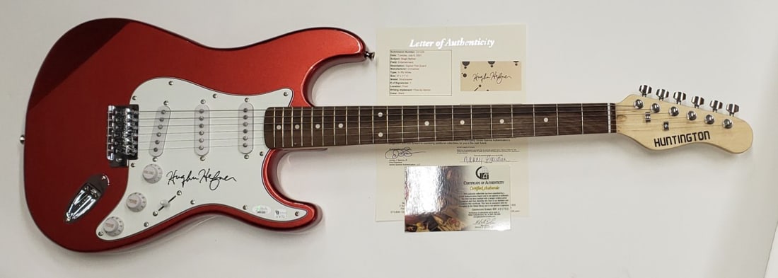 Hugh Hefner Signed Electric Guitar JSA Authenticated Legend: Hugh Hefner Signed Electric Guitar JSA Authenticated Legend This authentic electric guitar is hand-signed by the legendary Hugh Hefner, adding a unique piece of memorabilia to any collection. The auto