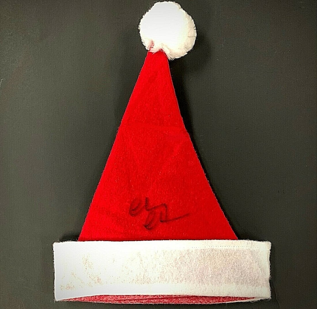 Santa Hat Signed by Chevy Chase from Christmas Vacation PSA DNA Authenticated: Santa Hat Signed by Chevy Chase from Christmas Vacation PSA DNA Authenticated This is an original Santa Claus hat signed by Chevy Chase, known for his role in the movie Christmas Vacation. The autogra