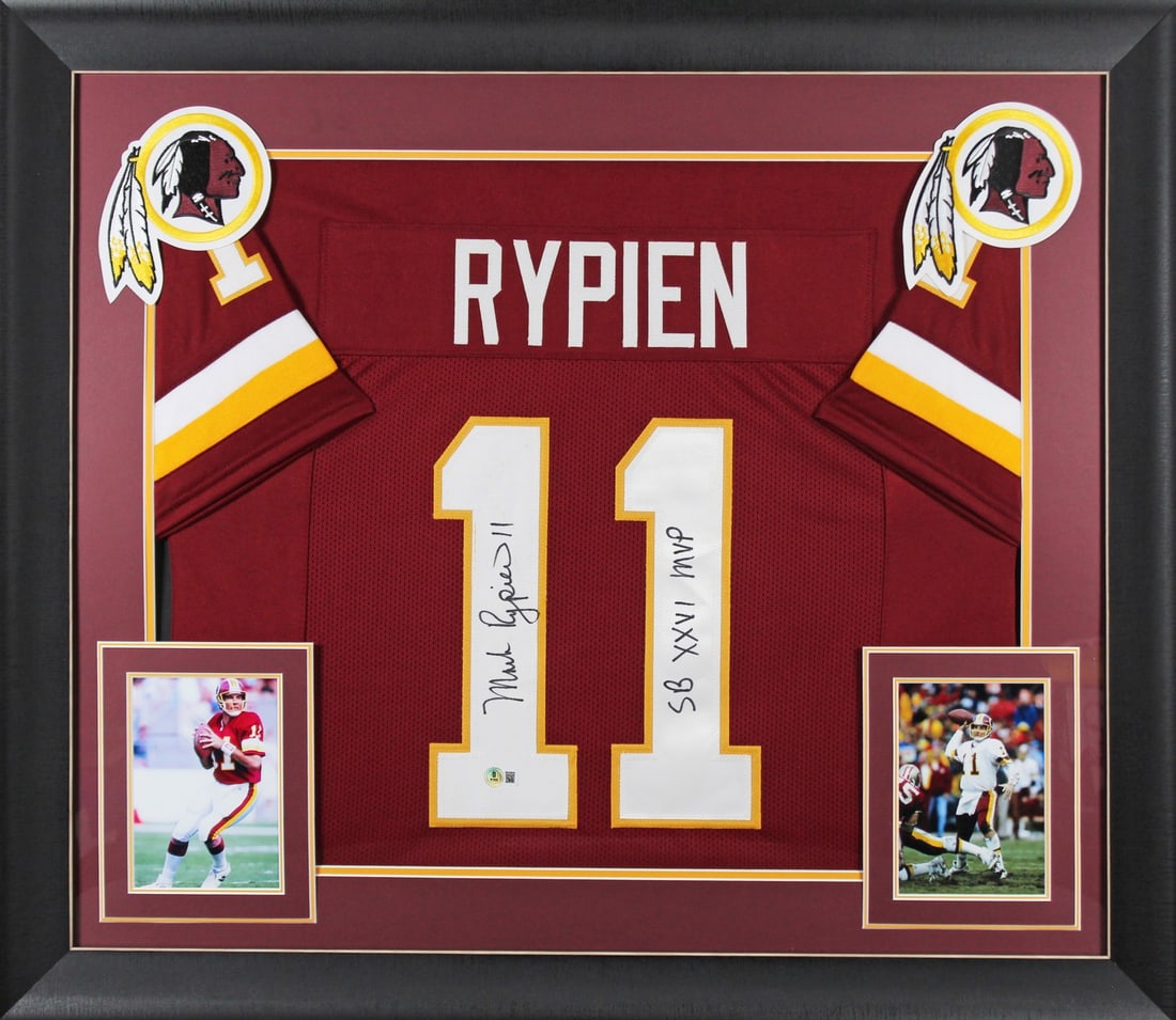 Framed Maroon Jersey Signed by Mark Rypien with SB XXVI MVP Inscription BAS Authenticated: Framed Maroon Jersey Signed by Mark Rypien with SB XXVI MVP Inscription BAS Authenticated This professionally framed maroon pro style jersey celebrates Mark Rypien's achievement as Super Bowl XXVI MVP