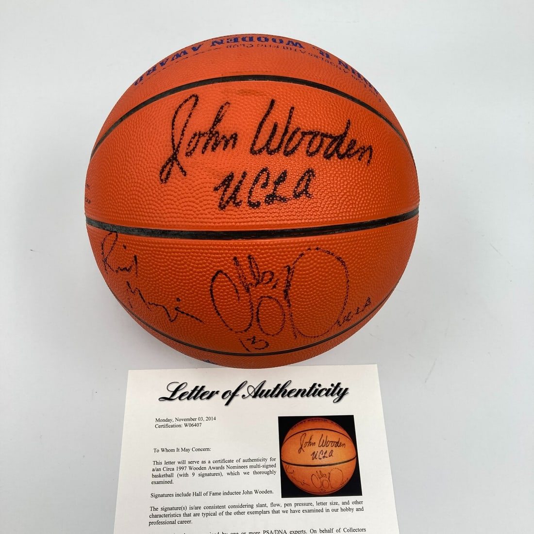 1997 Tim Duncan Rookie Multi Signed Basketball with John Wooden PSA: 1997 Tim Duncan Rookie Multi Signed Basketball with John Wooden PSA Celebrate basketball history with this 1997 Tim Duncan Rookie & John Wooden Award Winners Multi Signed Basketball. This original pie
