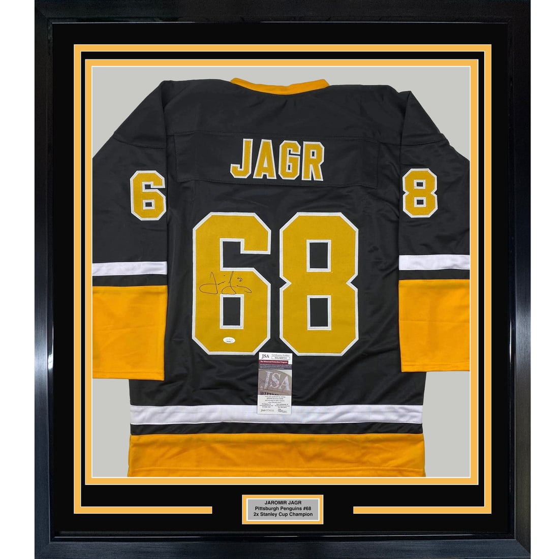 Framed Jaromir Jagr Autographed Jersey Pittsburgh Penguins JSA COA 35x39: Framed Jaromir Jagr Autographed Jersey Pittsburgh Penguins JSA COA 35x39 Celebrate the legacy of Jaromir Jagr with this professionally framed and autographed Pittsburgh Penguins black jersey. Measurin