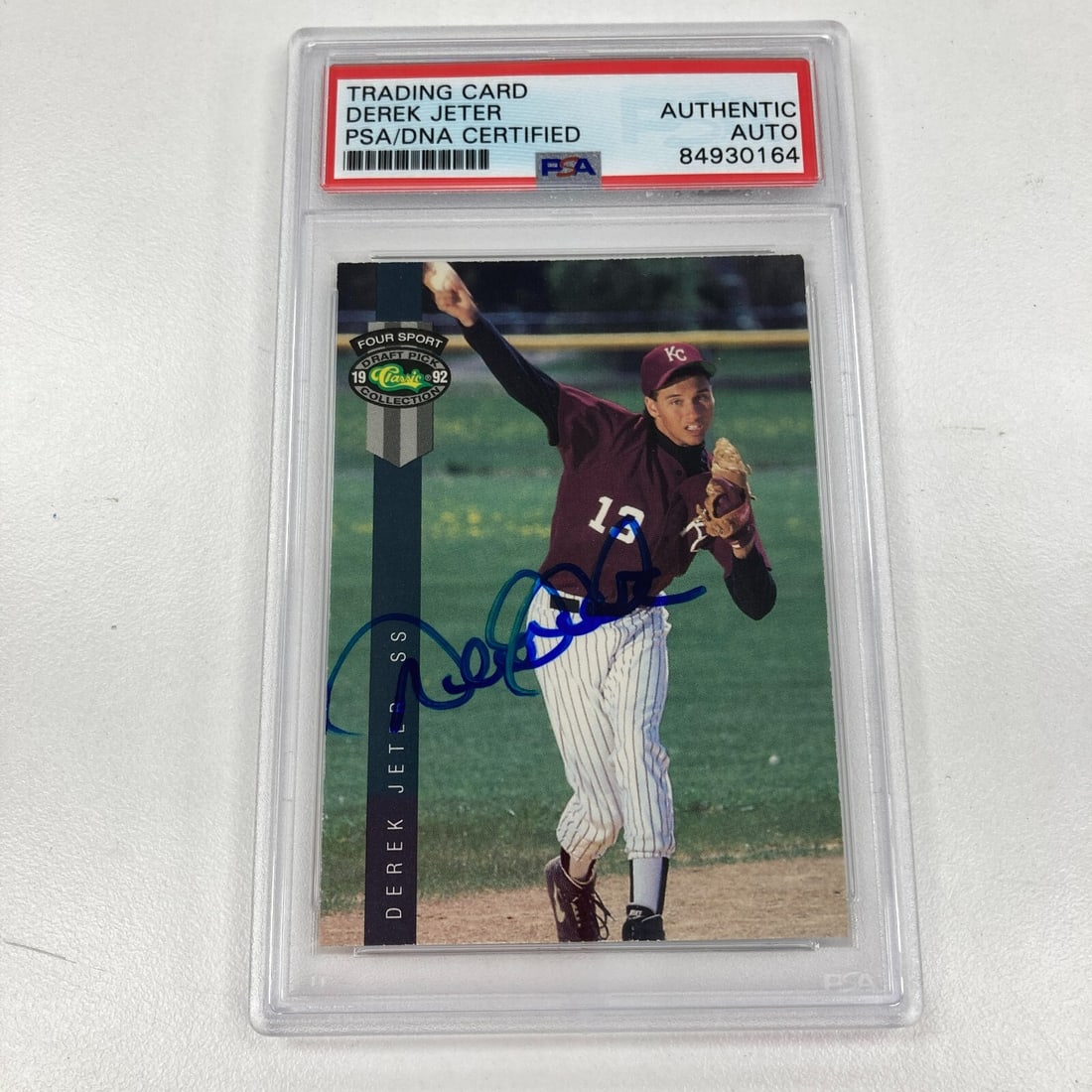 1992 Derek Jeter Signed Rookie Baseball Card Auto PSA #231: 1992 Derek Jeter Signed Rookie Baseball Card Auto PSA #231 This 1992 Derek Jeter Signed Four Sport Classic Rookie Baseball Card is a must-have for any baseball memorabilia collector. This card feature