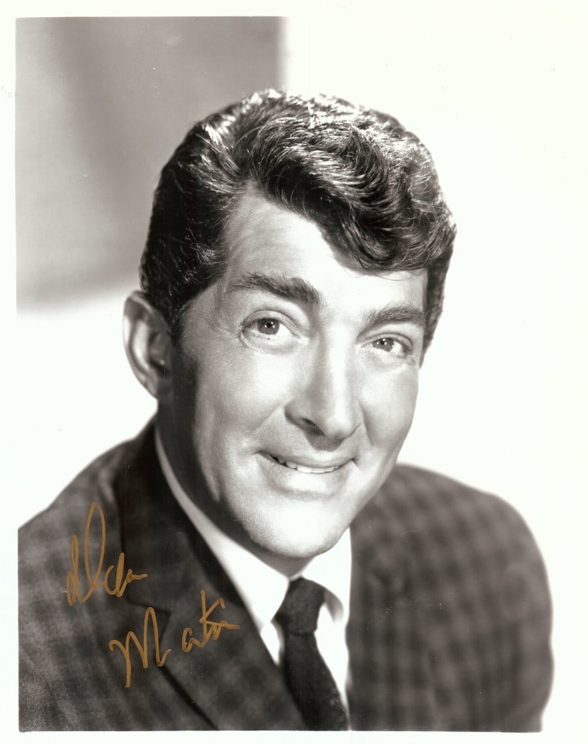 Dean Martin Signed 8x10 Photo Classic Suit JSA Authenticated: Dean Martin Signed 8x10 Photo Classic Suit JSA Authenticated This is an original 8x10 black and white photograph featuring Dean Martin in a classic suit, elegantly capturing his charisma. The photo is