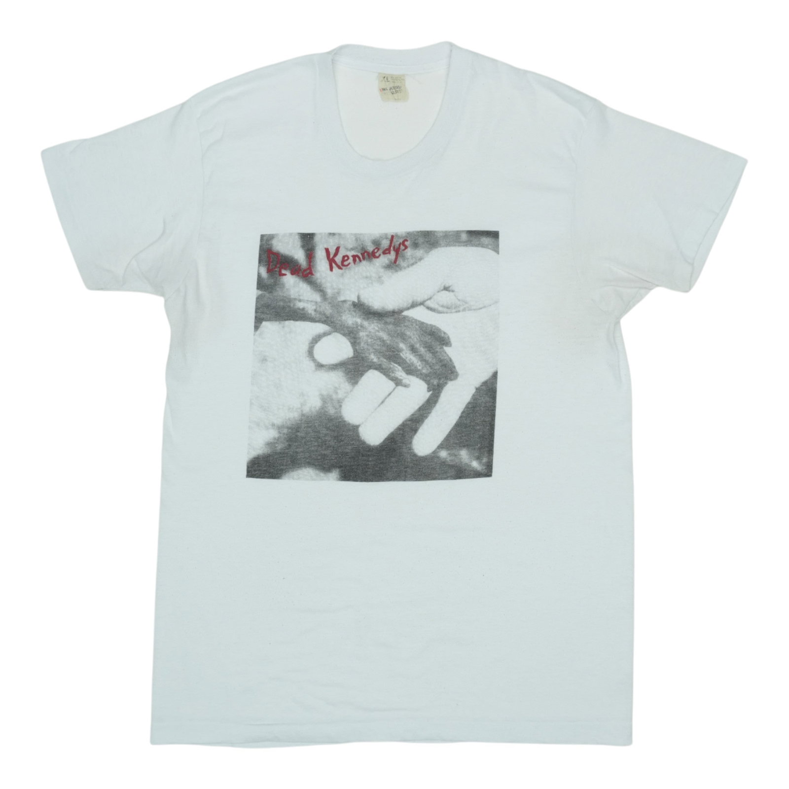 Vintage 1982 Plastic Surgery Disasters Band Tee White 50/50 Poly Cotton: Vintage 1982 Plastic Surgery Disasters Band Tee White 50/50 Poly Cotton This is an original vintage 1982 Dead Kennedys Plastic Surgery Disasters shirt. The shirt features no back graphics and is const