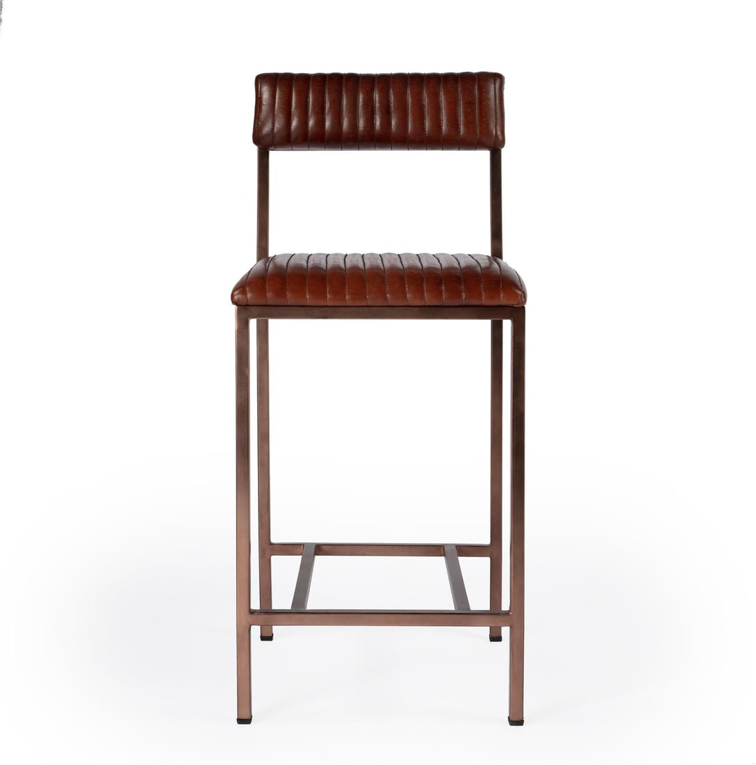 Butler Houston Industrial Counter Stool in Medium Brown Goat Leather: Butler Houston Industrial Counter Stool in Medium Brown Goat Leather Introducing the Industrial Houston Counter Stool, a striking blend of style and functionality. This stool features a robust industr