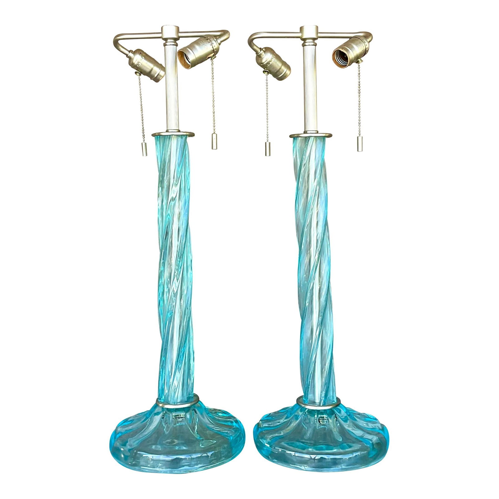 Pair of Vintage Boho Donghia Twist Blown Glass Lamps Sky Blue: Pair of Vintage Boho Donghia Twist Blown Glass Lamps Sky Blue Enhance your living space with the Vintage Boho Signed Donghia Blown Twist Glass Lamps. This pair of handcrafted lamps showcases the exqui