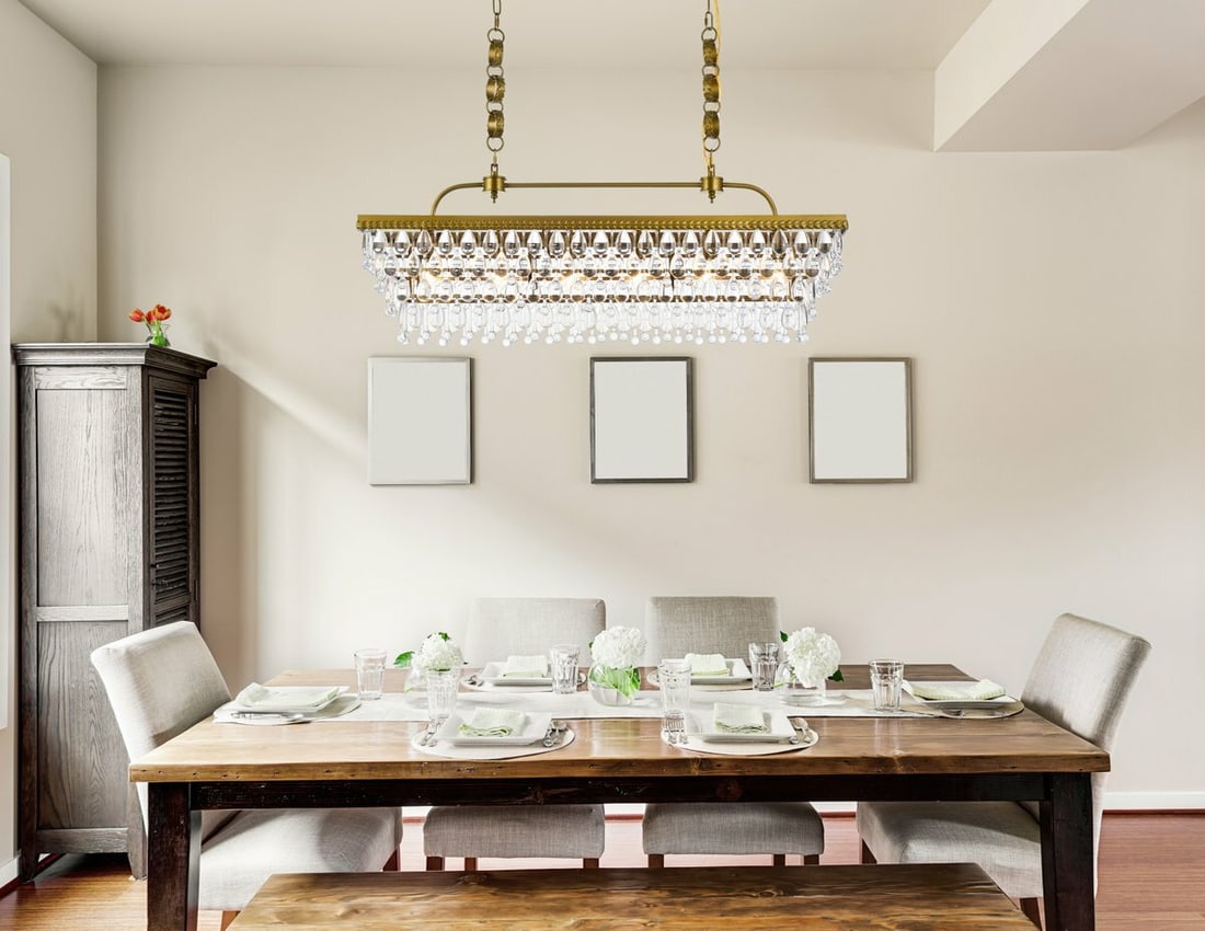 Living District Nordic 6 Light Brass Crystal Chandelier 40 Inch: Living District Nordic 6 Light Brass Crystal Chandelier 40 Inch This modern crystal chandelier features a 40-inch brass color frame adorned with royal cut clear crystals, making it an elegant centerpi