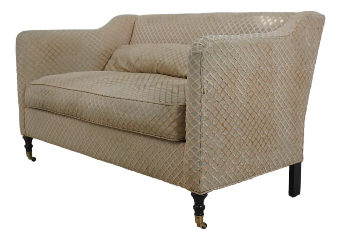 Ashley Manor Beige Upholstered Loveseat with Brass Capped Legs: Ashley Manor Beige Upholstered Loveseat with Brass Capped Legs This charming Ashley Manor Down Seat Upholstered Loveseat combines elegance and comfort, featuring a quality textured modern print uphols