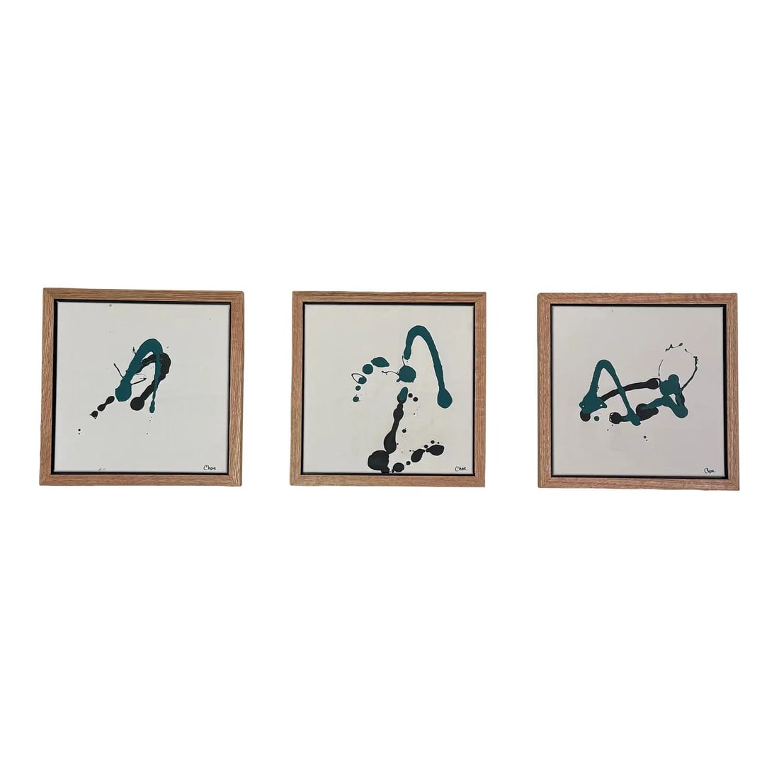 Chae Flux Echoes in Teal Set of 3 Framed Paintings: Chae Flux Echoes in Teal Set of 3 Framed Paintings Enhance your space with this set of three framed paintings titled "Echoes in Teal" by Chae Flux. Each artwork features dynamic abstract teal and blac
