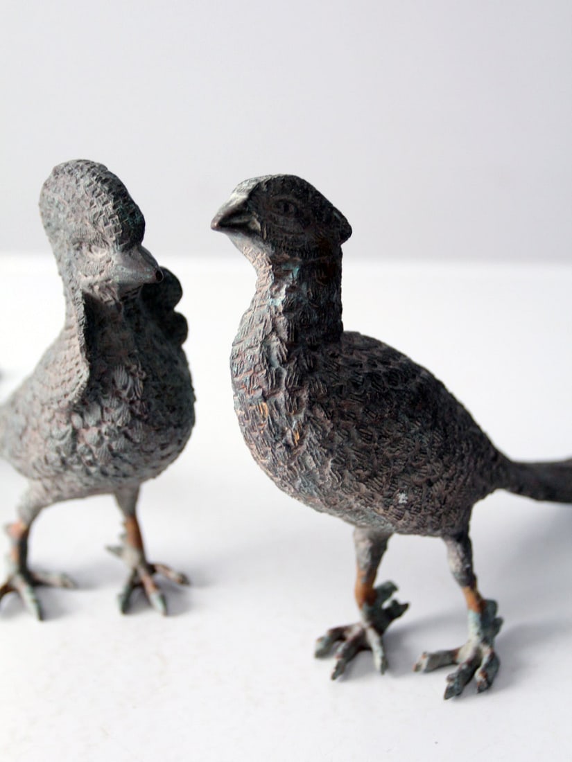 Vintage Metal Mid-Century Pheasant Figurines Pair with Verdigris Patina: Vintage Metal Mid-Century Pheasant Figurines Pair with Verdigris Patina This exquisite pair of vintage tabletop pheasant figurines showcases stunning craftsmanship and intricate detailing. Crafted fro
