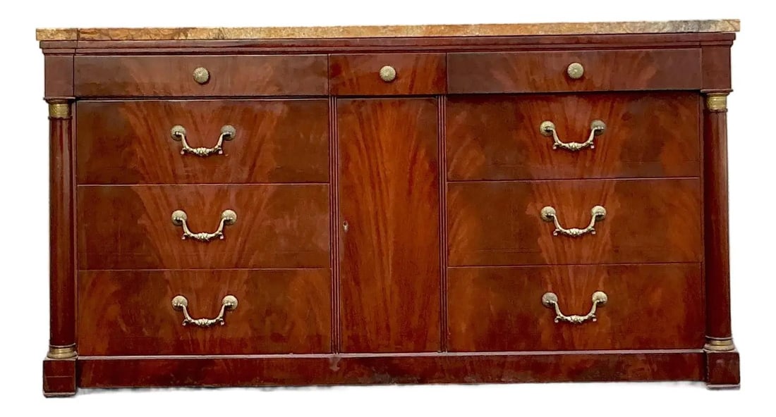 Empire Style Flame Mahogany Credenza With Sienna Marble Top and Brass Accents: Empire Style Flame Mahogany Credenza With Sienna Marble Top and Brass Accents This vintage Empire style credenza showcases the stately elegance of the Napoleonic era, featuring spectacular flame mahog